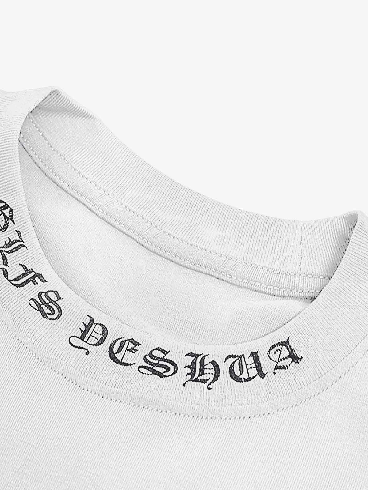 Close-up of a white garment with black text on a white background