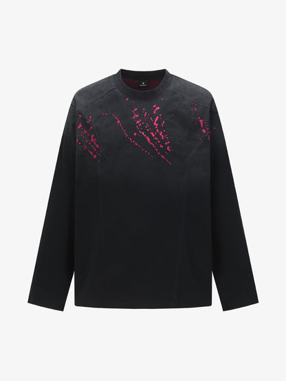 Stylish Black Long Sleeve Top with Pink Splatter Design for Modern Fashionistas