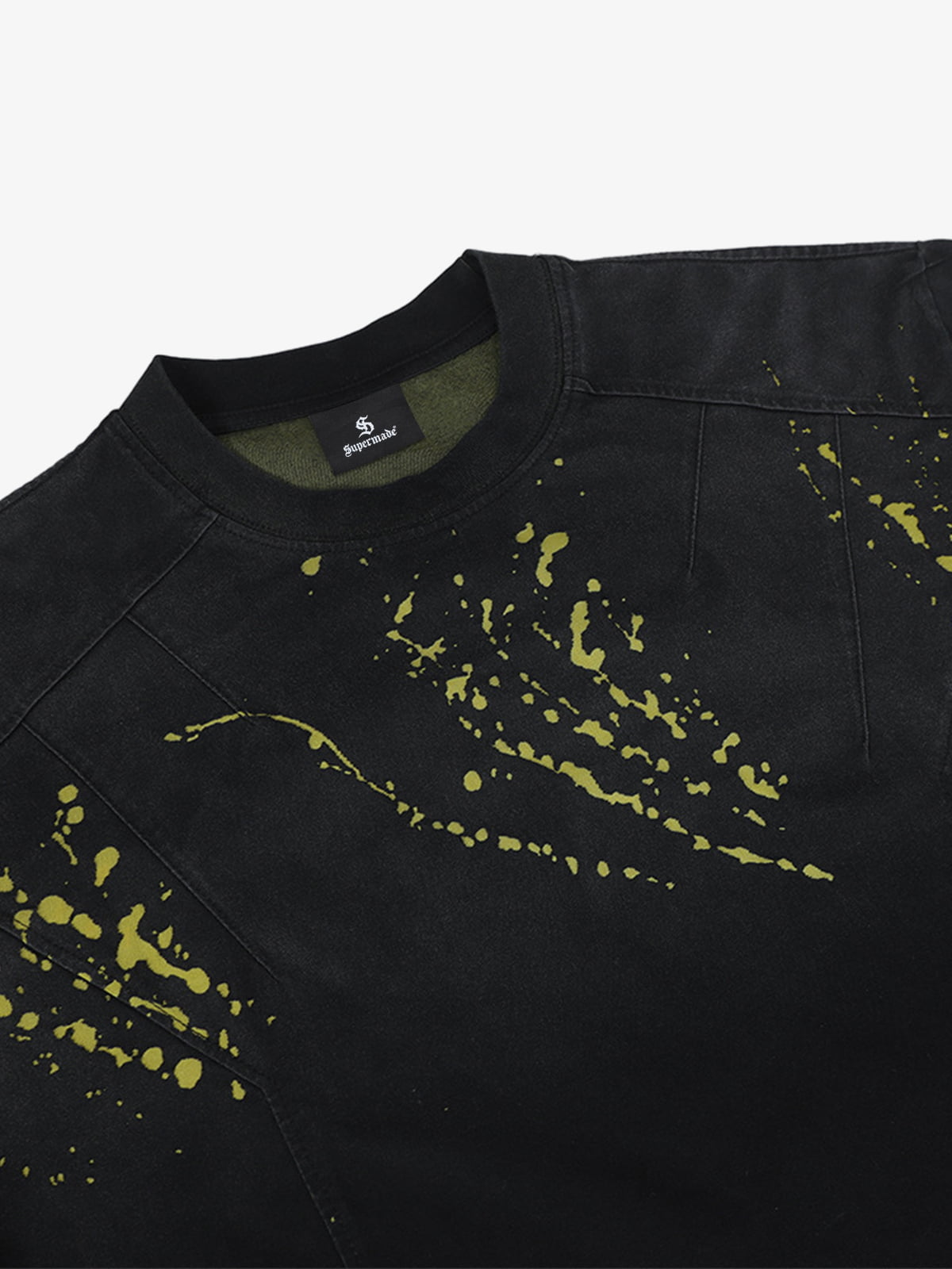 Stylish Black Long Sleeve Top with Pink Splatter Design for Modern Fashionistas