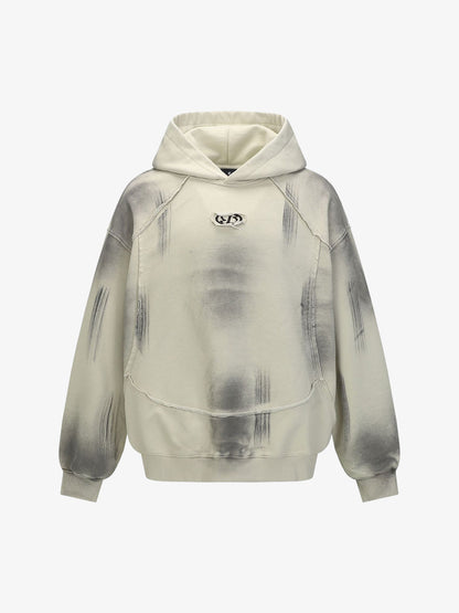 Trendy Tie-Dye Hoodie with Unique Distressed Design for Casual Wear
