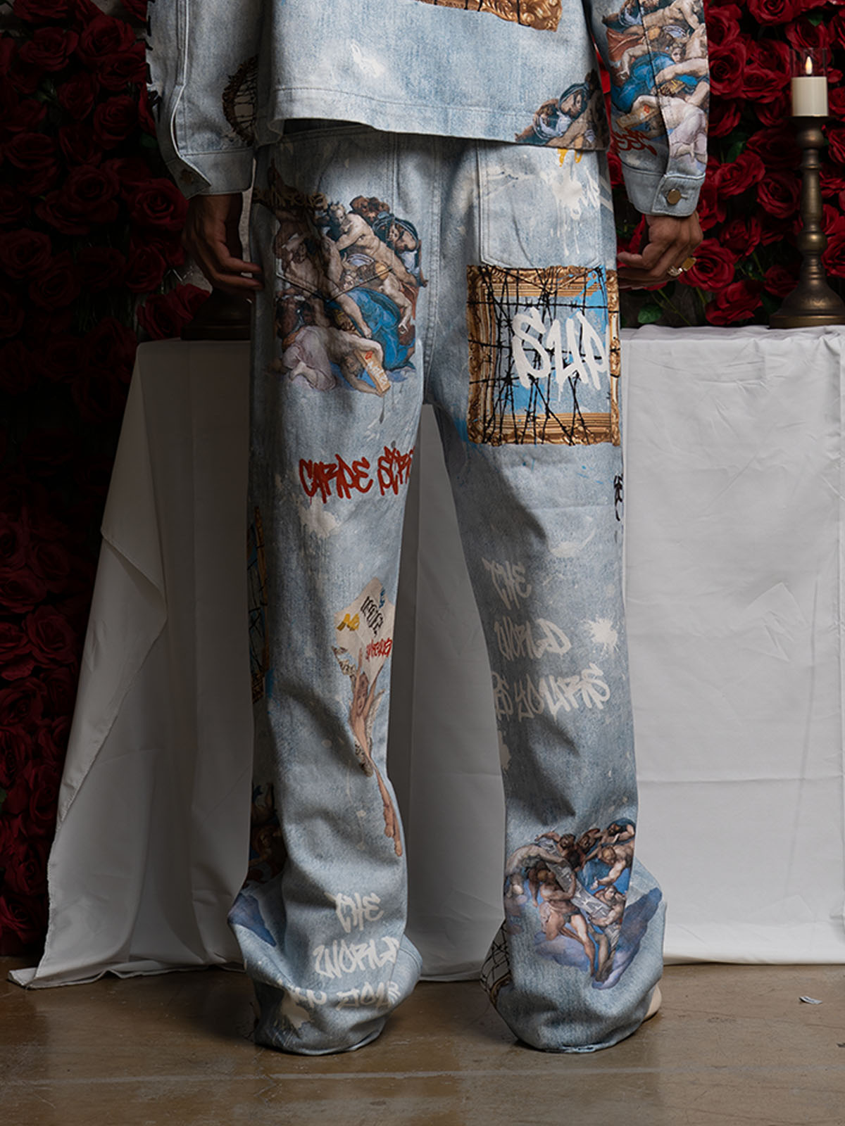 Artistic Denim Wide-Leg Jeans with Angelic Prints and Graffiti Details