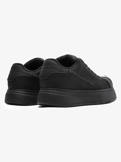 Black Chunky Sneakers with Fluid Lines and Granular Outsole for Everyday Wear