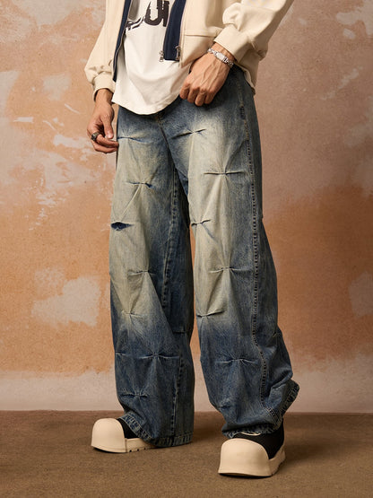Distressed Washed Pleated Jeans