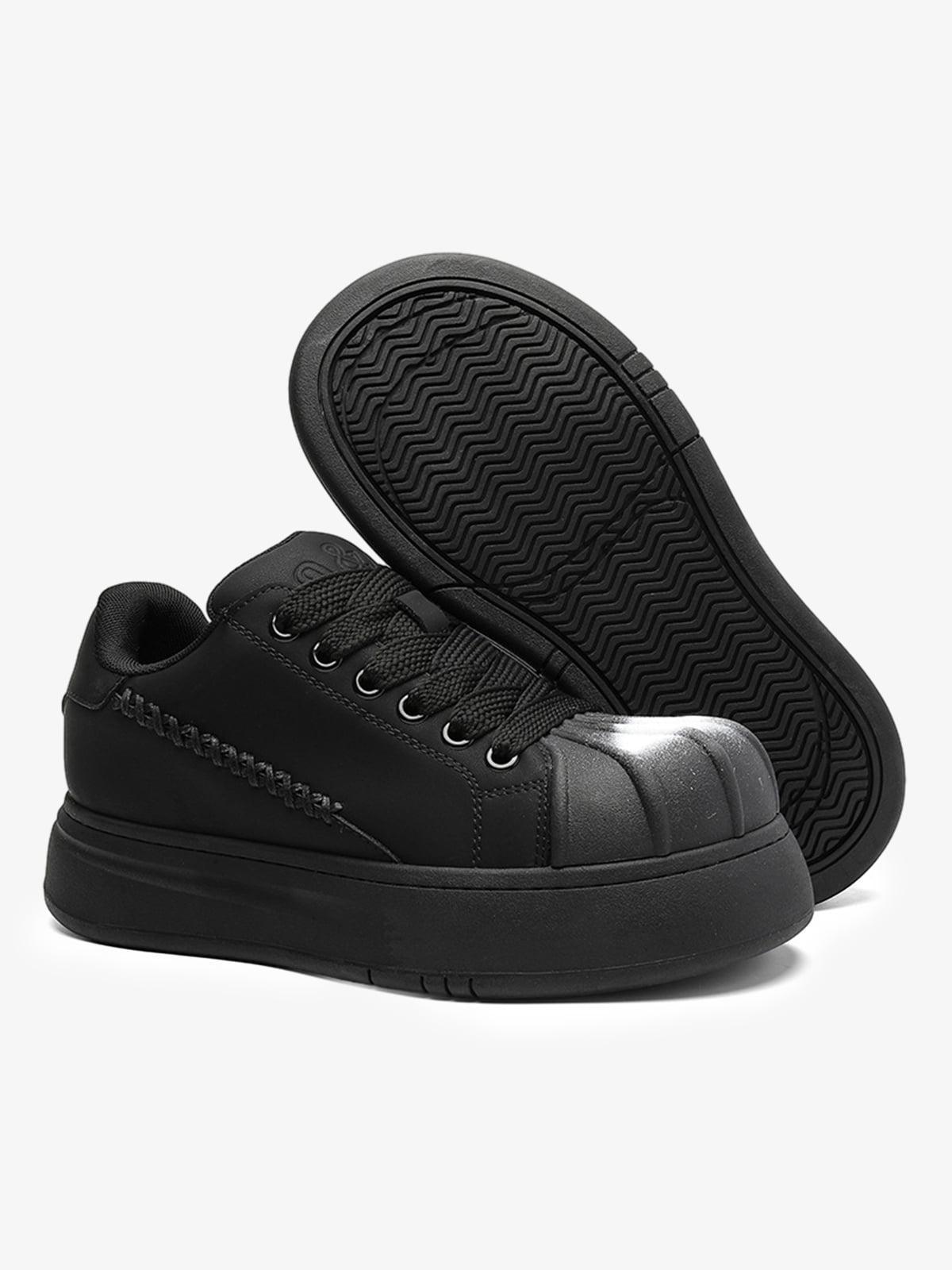 Black Chunky Sneakers with Fluid Lines and Granular Outsole for Everyday Wear
