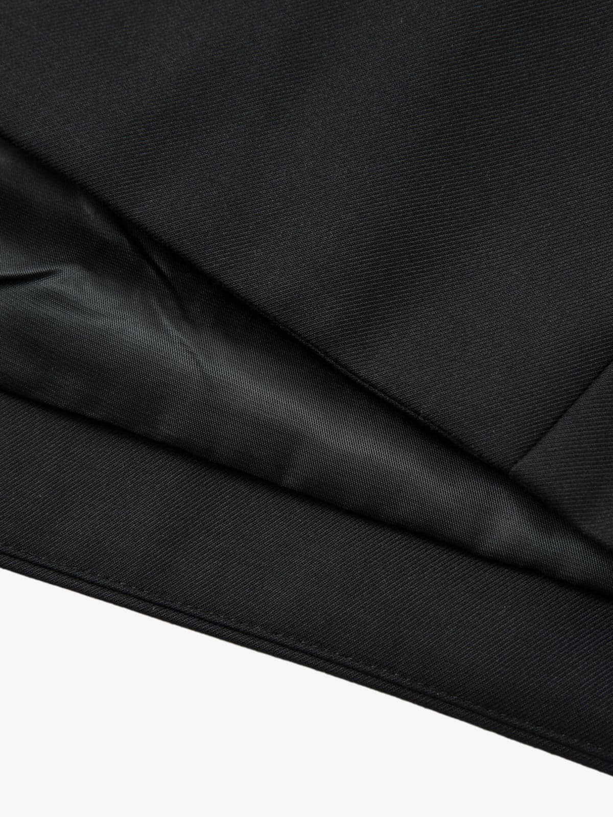 Stylish Black Jacket with Intricate White Embroidery Design