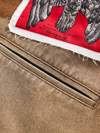 Unique Patchwork Denim Jacket with Iconic Graphic Prints