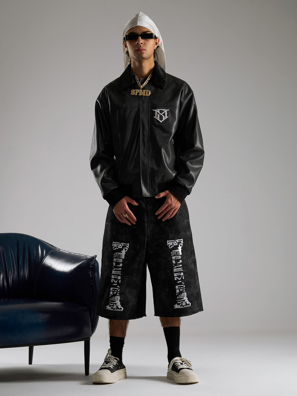 SUPM Leather Jacket with a Fur Collar and Bullet Hole Monogram Print and Rhinestone Pattern