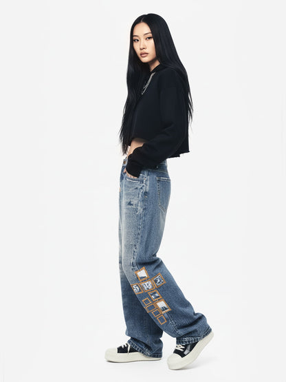 Frame Cross Print Denim Jeans