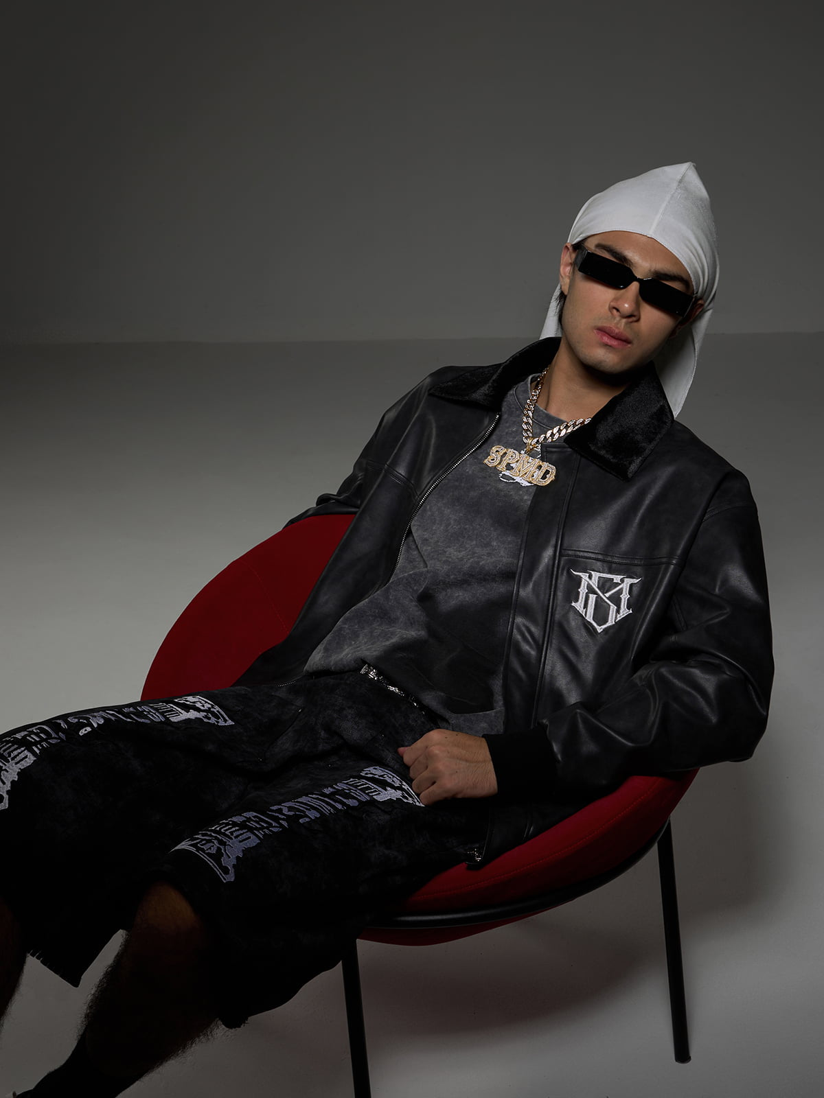 SUPM Leather Jacket with a Fur Collar and Bullet Hole Monogram Print and Rhinestone Pattern