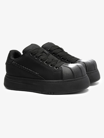 Black Chunky Sneakers with Fluid Lines and Granular Outsole for Everyday Wear