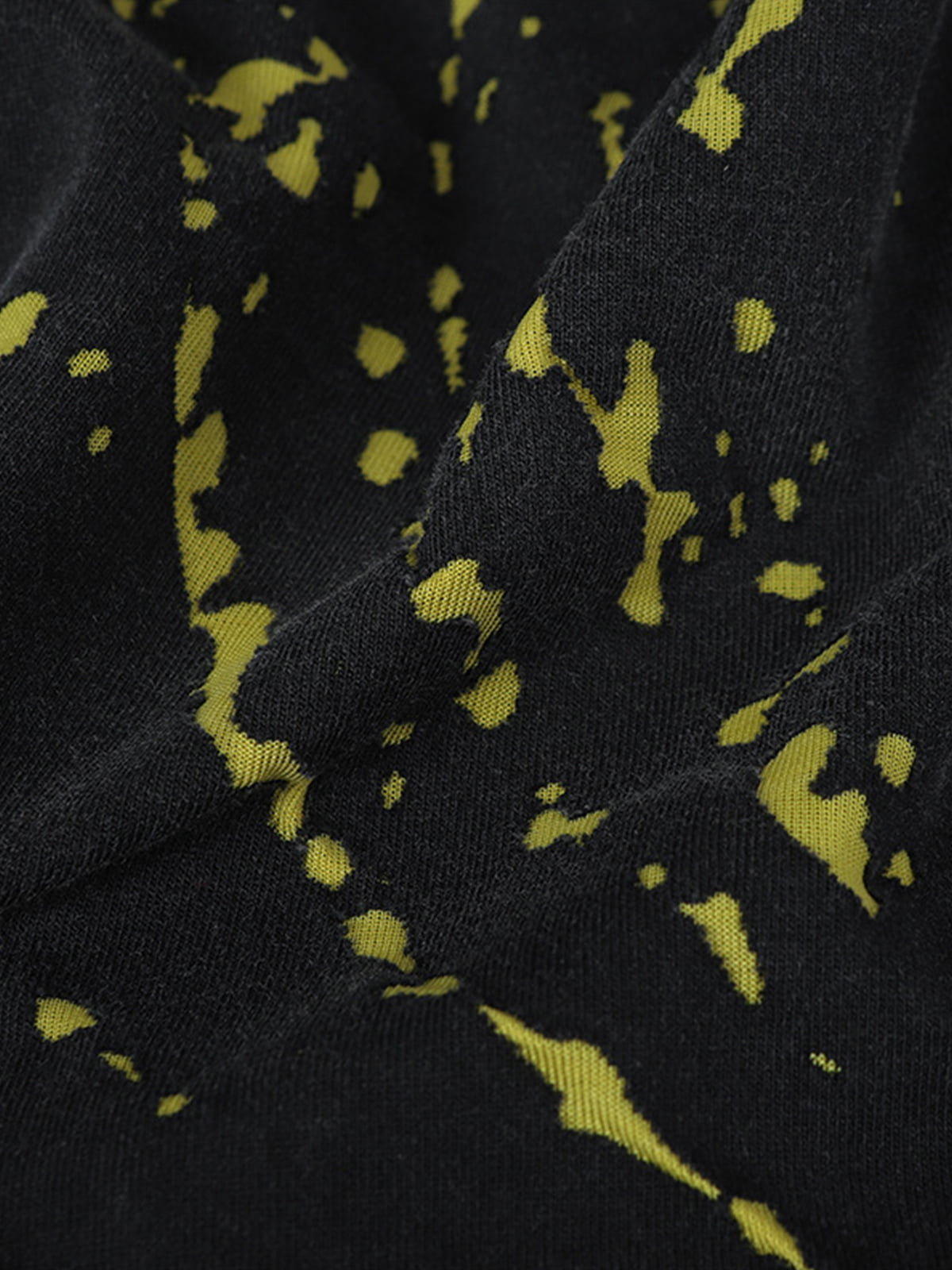 Stylish Black Long Sleeve Top with Pink Splatter Design for Modern Fashionistas