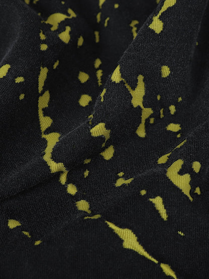 Stylish Black Long Sleeve Top with Pink Splatter Design for Modern Fashionistas