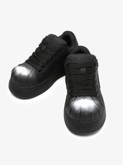 Black Chunky Sneakers with Fluid Lines and Granular Outsole for Everyday Wear