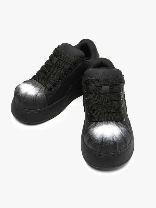 Black Chunky Sneakers with Fluid Lines and Granular Outsole for Everyday Wear