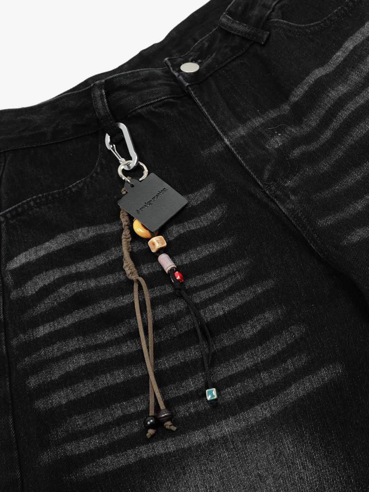 Distressed Black Denim Jeans with Embroidered Design and Cross Patch