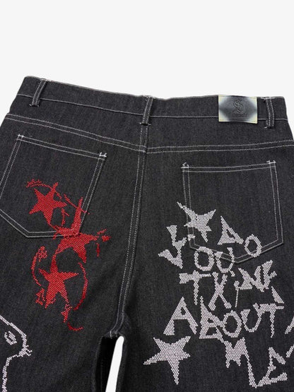 Denim Graffiti Wide Leg Pants with Embroidered Art Design and Bold Statement Text 