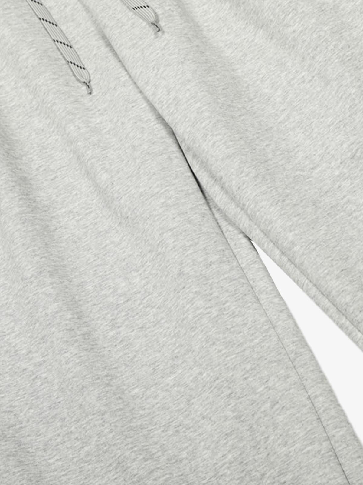 Checkered Wide-Leg Pants with Asymmetric Zippered Panel 