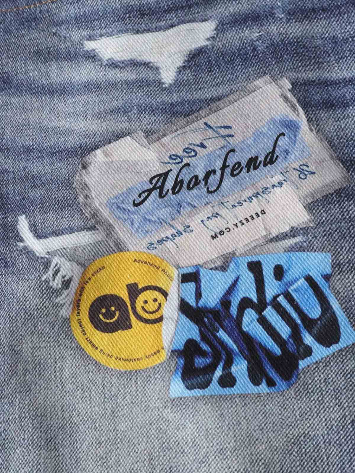 Denim Patchwork Wide Leg Jeans with Graphic Appliques and Distressed Details?