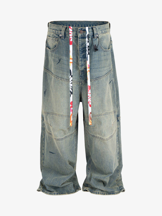 Wide-Leg Denim Trousers with Unique Tie Detail for Fashionable Comfort 