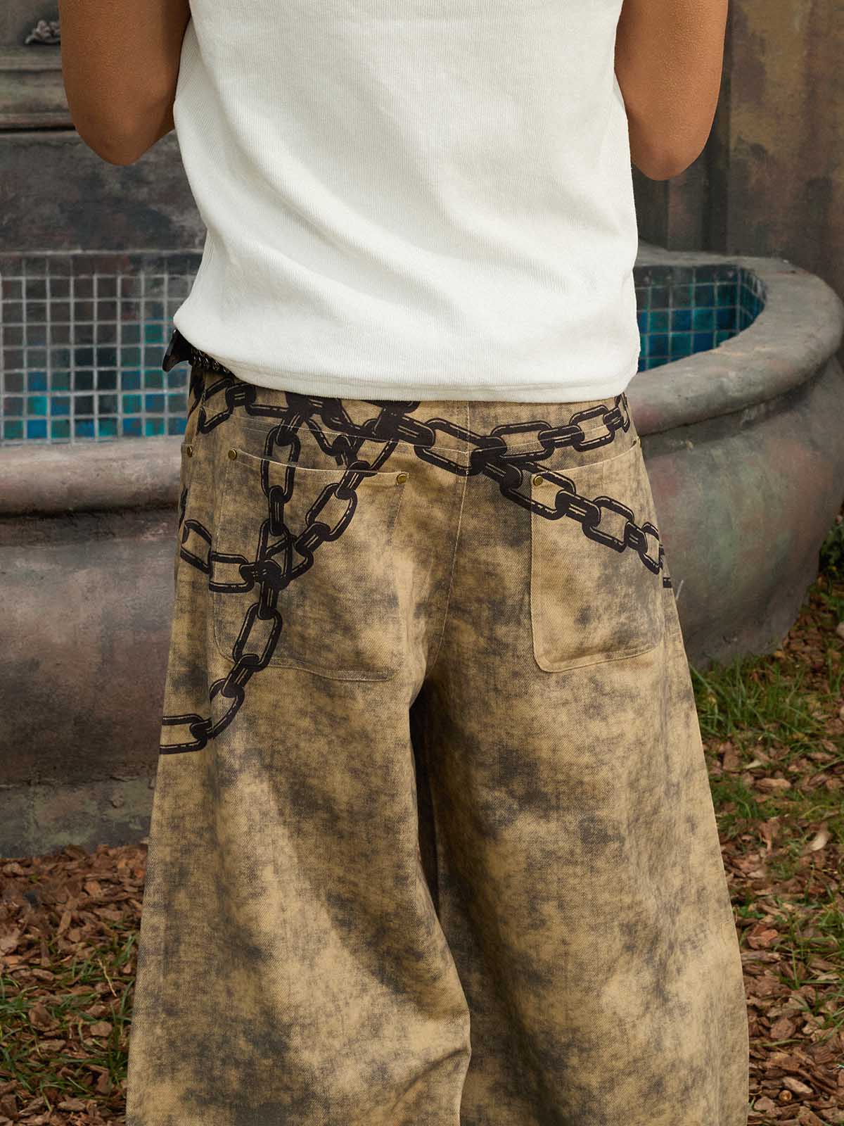 Supermade Distressed Chain And Key Print Baggy Pants?