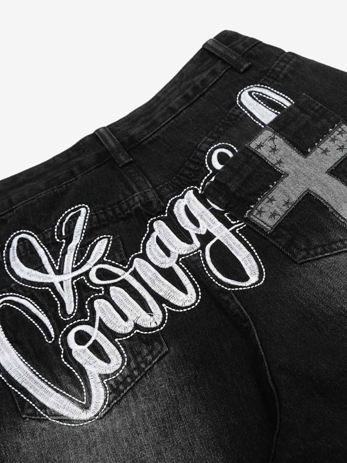 Distressed Black Denim Jeans with Embroidered Design and Cross Patch 