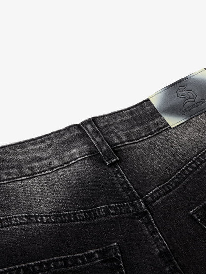 Black Denim Wide-Leg Jeans with Asymmetric Stitching and Button Details?