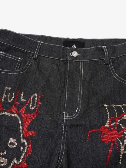 Denim Graffiti Wide Leg Pants with Embroidered Art Design and Bold Statement Text 
