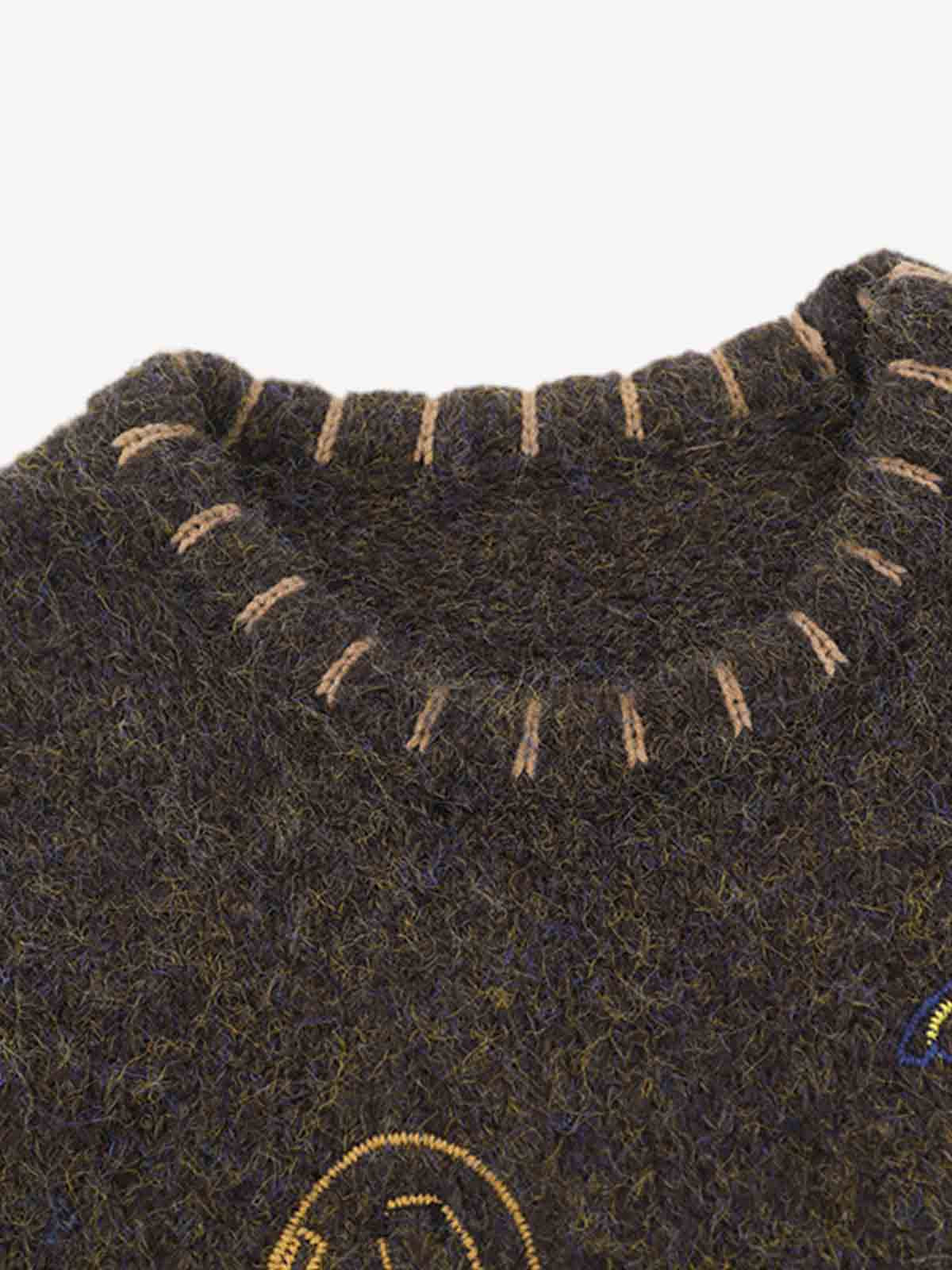 Wool Blend Embroidered Sleeveless Knit Vest with Whimsical Animal Motifs and Artistic Stitching Details?