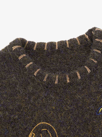 Wool Blend Embroidered Sleeveless Knit Vest with Whimsical Animal Motifs and Artistic Stitching Details?