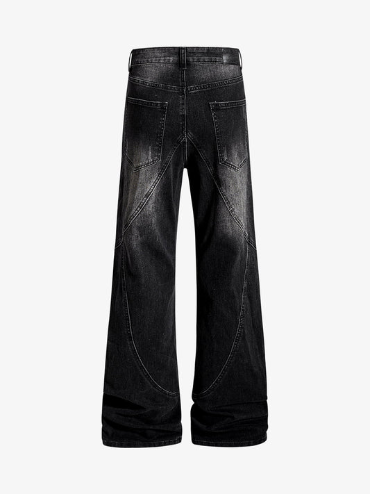 Black Denim Wide-Leg Jeans with Asymmetric Stitching and Button Details?