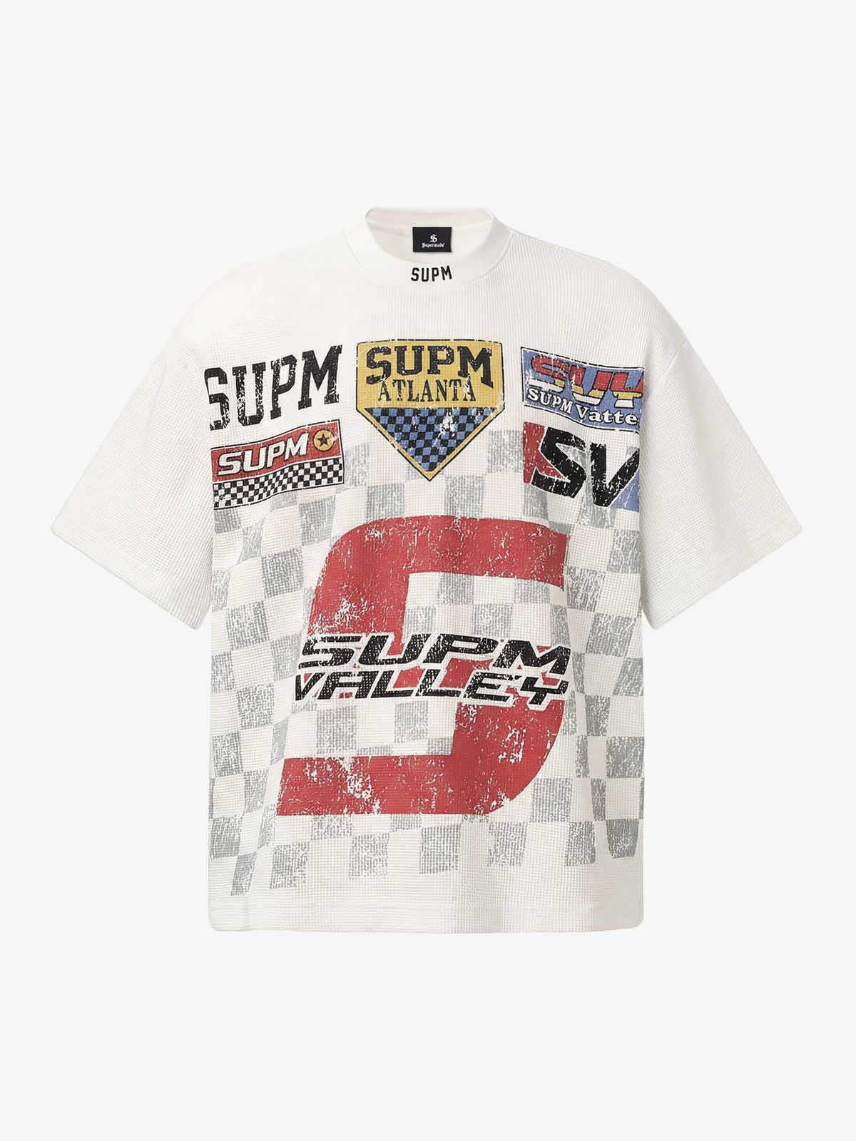 Cotton Oversized Graphic T-Shirt with Newspaper Print and Metal Eyelets?