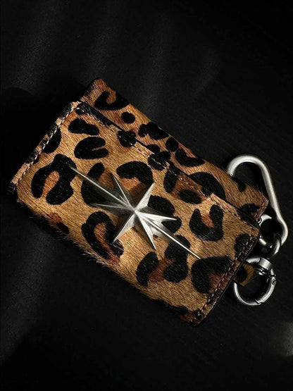 Leather Keychain with Star Emblem - Premium Black Leather Key Holder with Metal Clasp and Decorative Star Design?