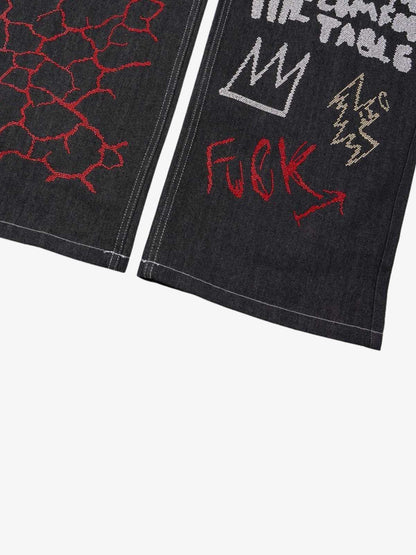 Denim Graffiti Wide Leg Pants with Embroidered Art Design and Bold Statement Text 