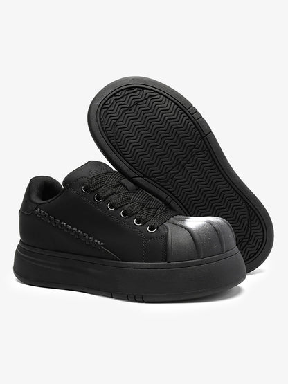 Black Chunky Sneakers with Fluid Lines and Granular Outsole for Everyday Wear 
