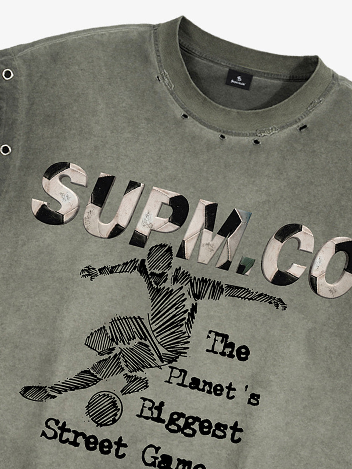 Distressed streetwear style loose sleeveless vest, decorated with a soccer print pattern and distressed and washed details, with metal eyelet details. 