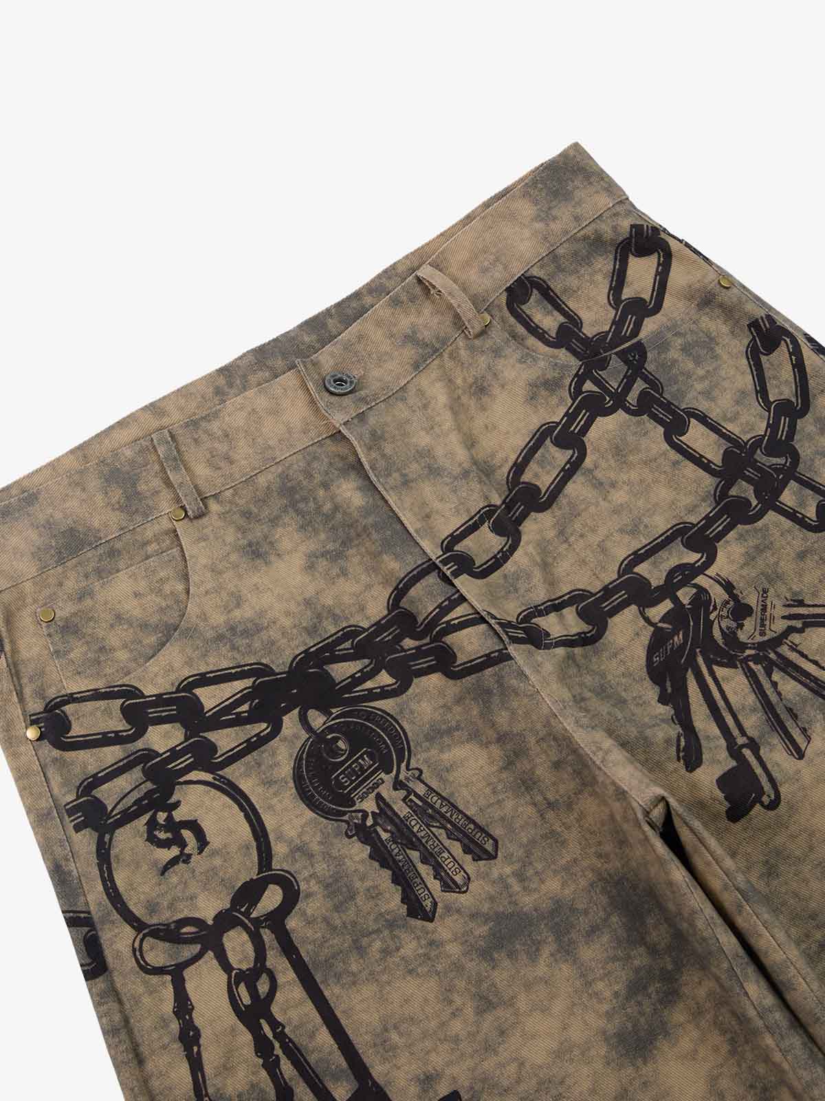 Supermade Distressed Chain And Key Print Baggy Pants?