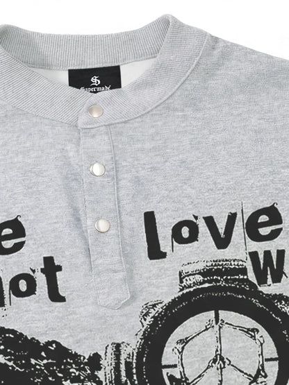 Cotton blend loose-fitting stand-up collar button-front short-sleeved T-shirt with anti-war print. 