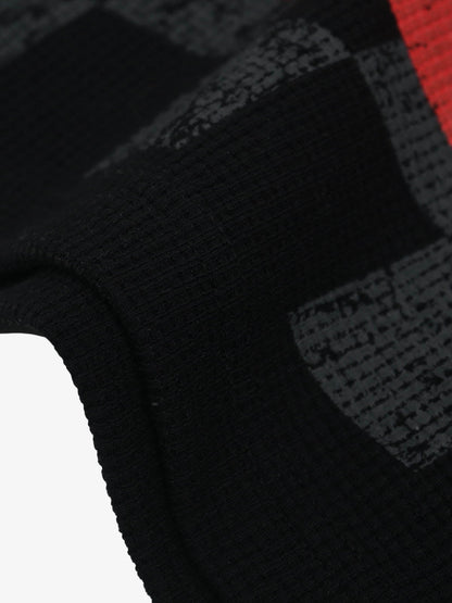 Cotton Oversized Graphic T-Shirt with Newspaper Print and Metal Eyelets?