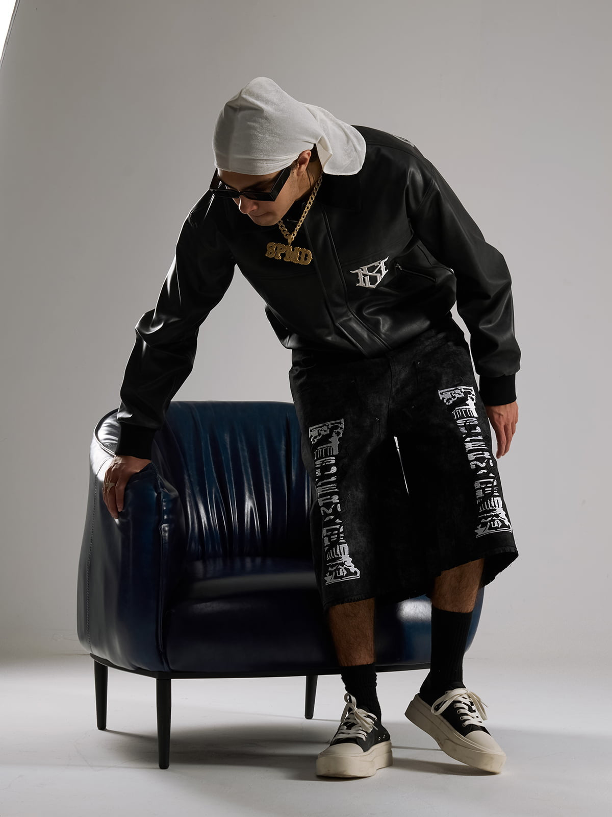 SUPM Leather Jacket with a Fur Collar and Bullet Hole Monogram Print and Rhinestone Pattern 