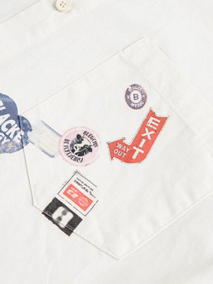 Stylish White Button-Up Shirt with Unique Patch Design for Casual and Trendy Looks?