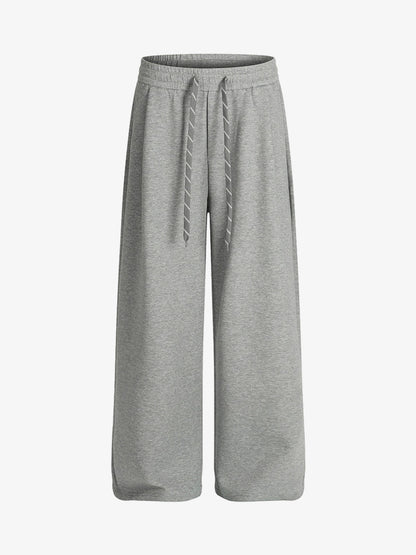 Checkered Wide-Leg Pants with Asymmetric Zippered Panel 