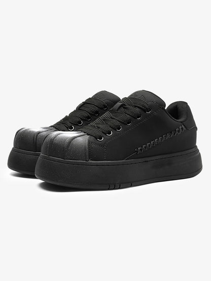 Black Chunky Sneakers with Fluid Lines and Granular Outsole for Everyday Wear 