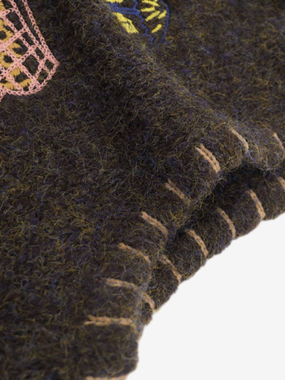 Wool Blend Embroidered Sleeveless Knit Vest with Whimsical Animal Motifs and Artistic Stitching Details?