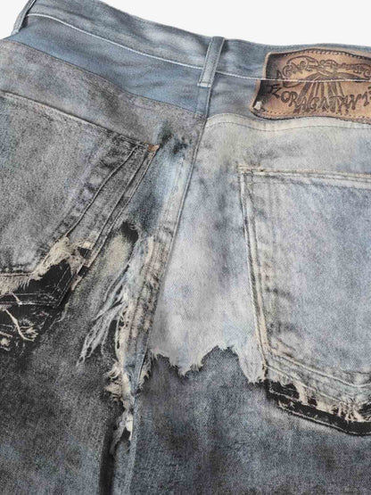 Distressed Denim Wide Leg Pants with Ripped Details and Faded Wash 
