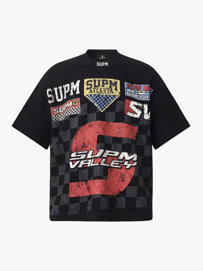 Cotton Oversized Graphic T-Shirt with Newspaper Print and Metal Eyelets?