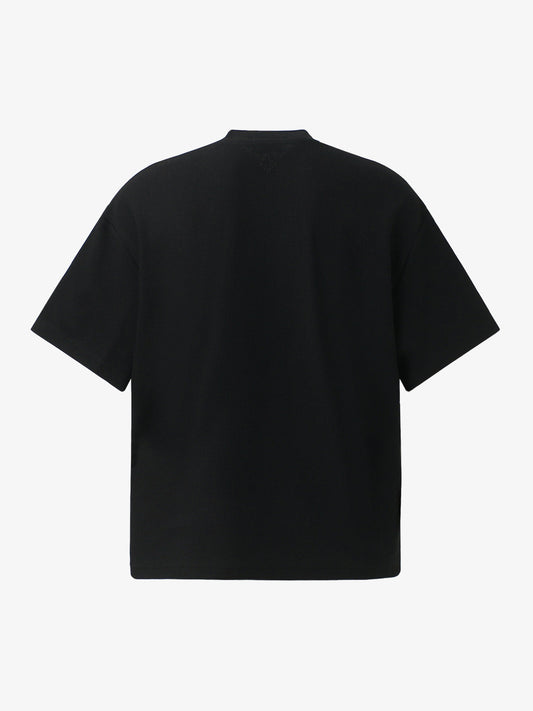Cotton Oversized Graphic T-Shirt with Newspaper Print and Metal Eyelets?