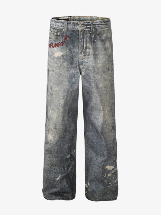 Distressed heavy-duty painted straight-leg jeans, adorned with red graffiti prints and paint-splatter wash effects?