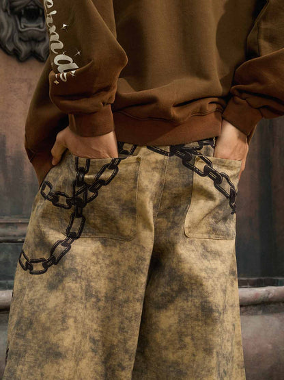 Supermade Distressed Chain And Key Print Baggy Pants?